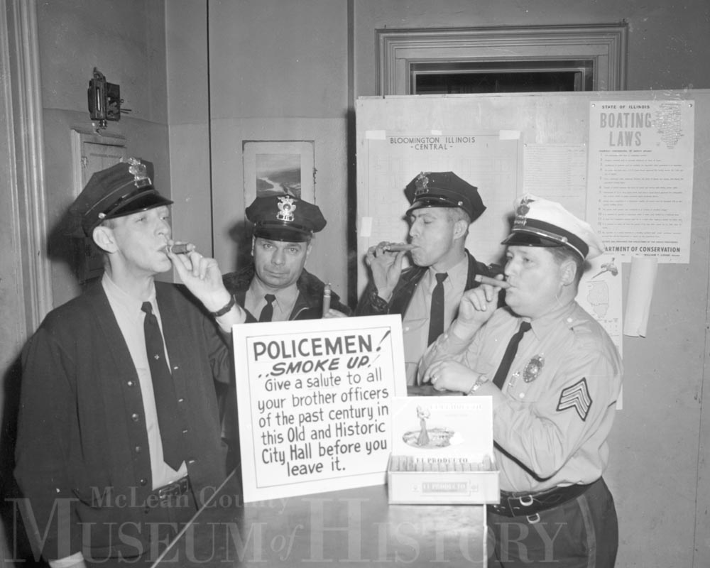 Bloomington policemen enjoying cigars, 1963.