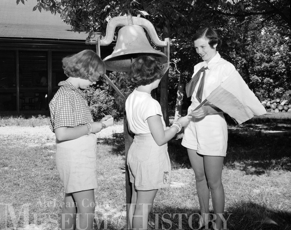 Girl Scout camp counselor and campers, 1950.