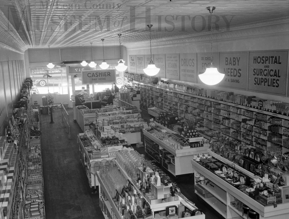 Photo of the interior of ​Payless Drugs, 317 N. Main St., 1940