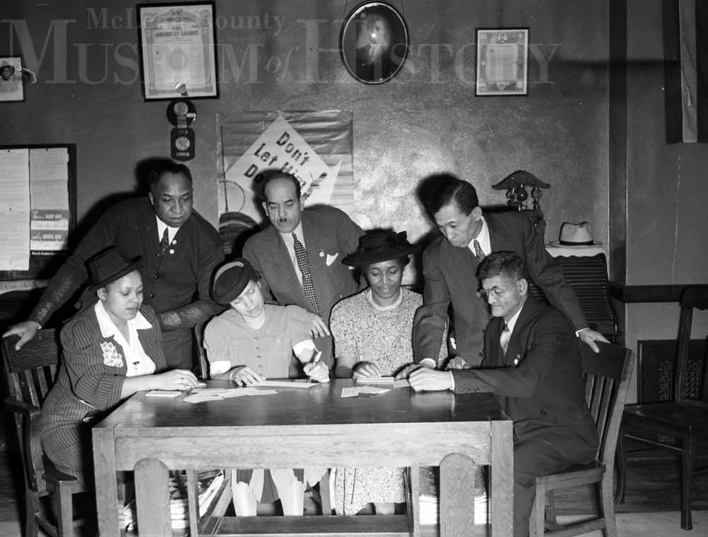 Seen here are Redd-Williams post members and auxiliary leaders planning a President’s Birthday Ball for January 30, 1942.