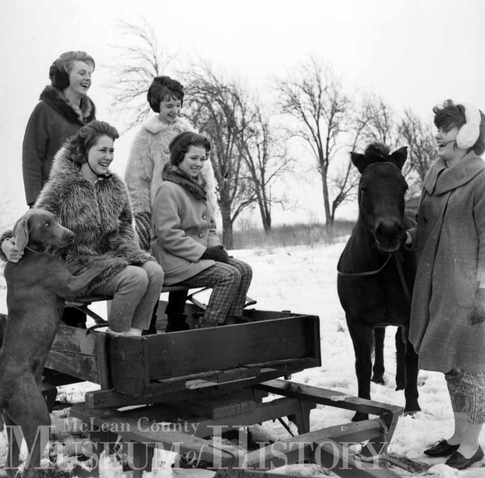 Unknown women enjoying a sleigh ride, 1963