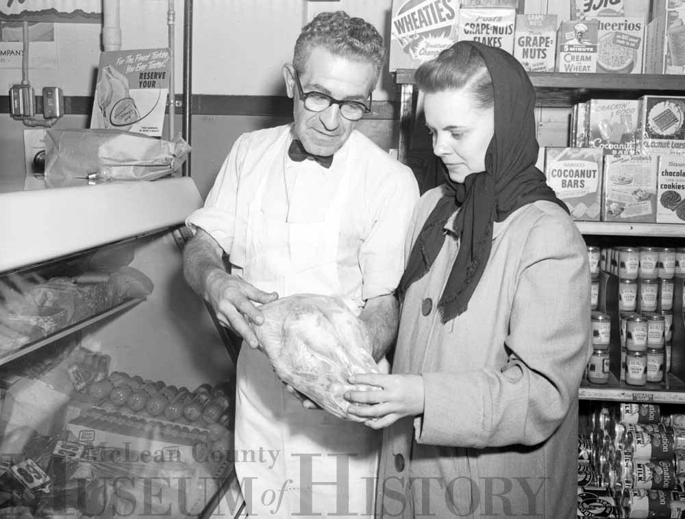 Ed Peifer and shopper, 1952.