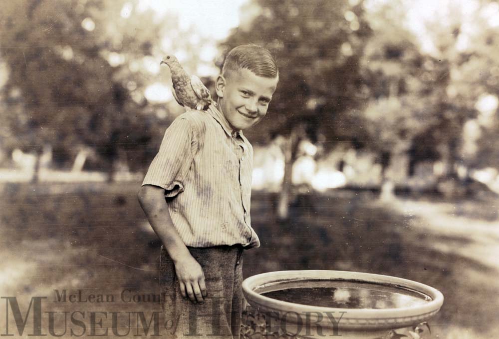 Victory Hall boy with a bird, 1930.
